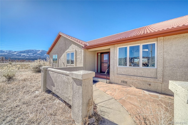 view of patio / terrace with a mountain view