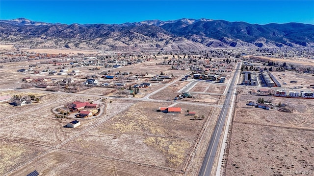 aerial view featuring a mountain view