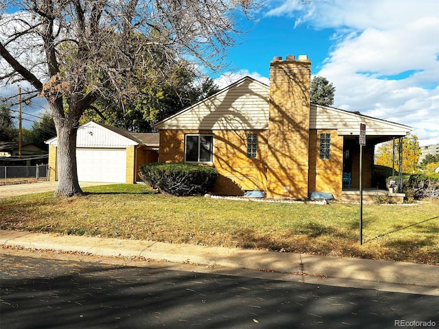 view of front facade featuring a garage and a front lawn