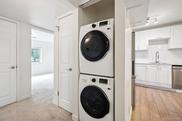 29656 Buffalo Park Rd Unit 208, Evergreen, CO 80439 - laundry area with stacked washing machine and dryer