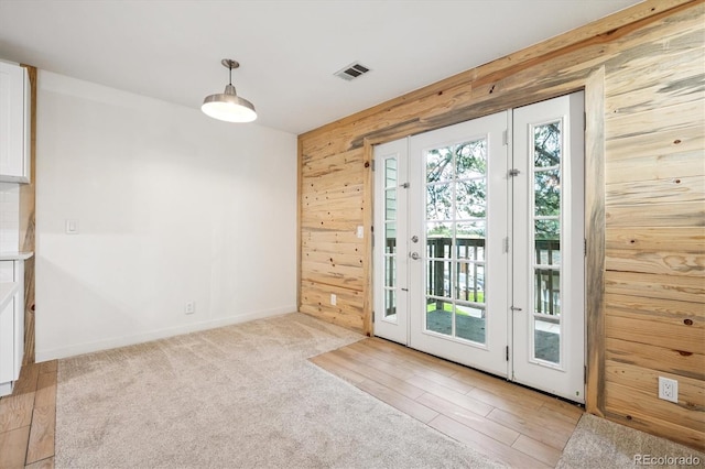 29656 Buffalo Park Rd Unit 208, Evergreen, CO 80439 - entryway featuring wood walls and wood finished floors