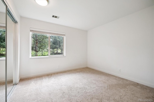 29656 Buffalo Park Rd Unit 208, Evergreen, CO 80439 - unfurnished bedroom with carpet and a closet