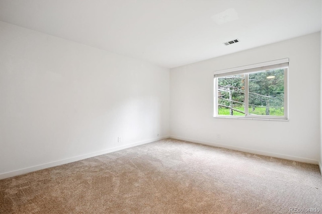 29656 Buffalo Park Rd Unit 208, Evergreen, CO 80439 - carpeted spare room featuring baseboards