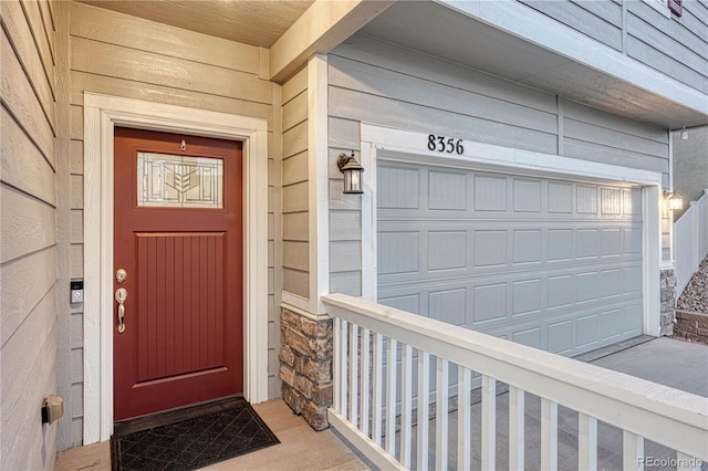 entrance to property with a garage