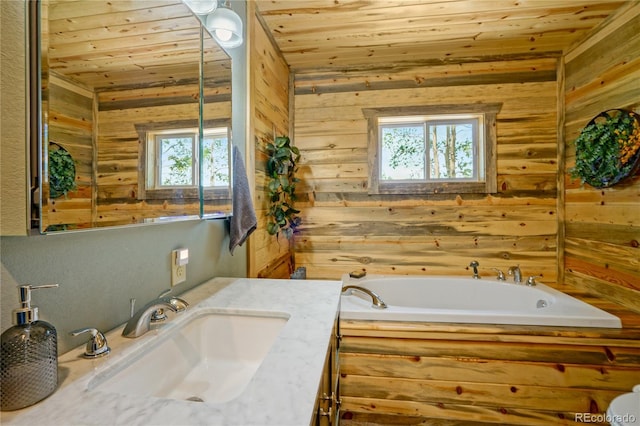 2474 Wendt Ln, Fort Garland, CO 81133 - bathroom with wooden ceiling, plenty of natural light, wood walls, a garden tub, and vanity