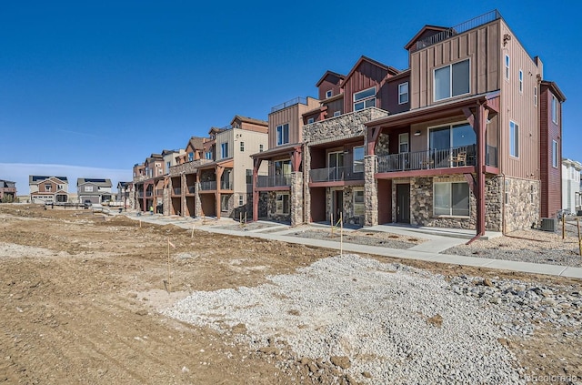 view of property with a residential view