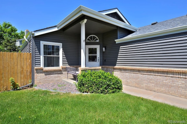 690 W Jamison Cir, Littleton, CO 80120 - view of front of property featuring brick siding and covered porch