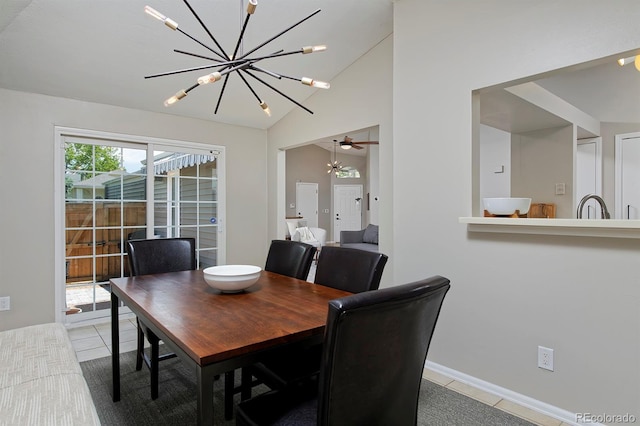 690 W Jamison Cir, Littleton, CO 80120 - dining space with a chandelier, tile patterned flooring, lofted ceiling, and baseboards