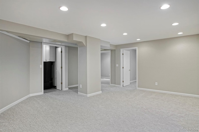 690 W Jamison Cir, Littleton, CO 80120 - finished below grade area featuring recessed lighting, light colored carpet, and baseboards