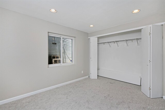 690 W Jamison Cir, Littleton, CO 80120 - unfurnished bedroom featuring recessed lighting, carpet flooring, baseboards, and a closet