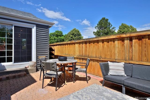 690 W Jamison Cir, Littleton, CO 80120 - view of patio with an outdoor living space and outdoor dining area