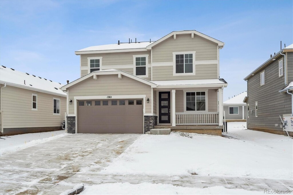 view of front of property featuring a garage