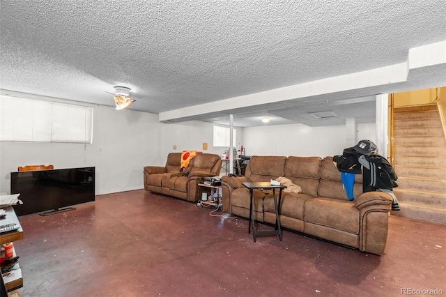 living room with a textured ceiling