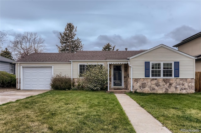 single story home featuring a front yard, roof with shingles, driveway, stone siding, and an attached garage