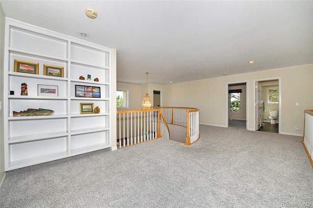 unfurnished room with recessed lighting, baseboards, carpet floors, and a chandelier