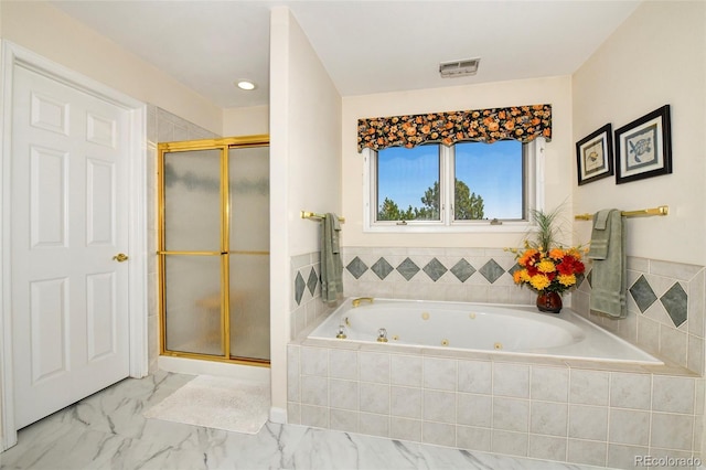 full bathroom with visible vents, a jetted tub, marble finish floor, and a shower stall