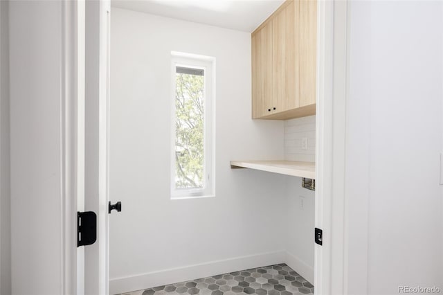 3932 Kalamath St, Denver, CO 80211 - washroom featuring baseboards and cabinet space