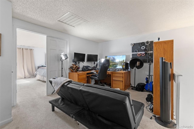 2092 S Helena St Unit C, Aurora, CO 80013 - home office featuring carpet and a textured ceiling