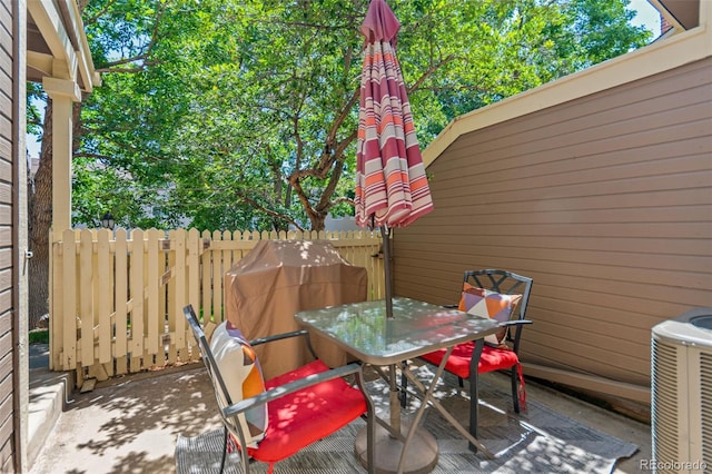 2092 S Helena St Unit C, Aurora, CO 80013 - view of patio / terrace featuring outdoor dining space and a grill