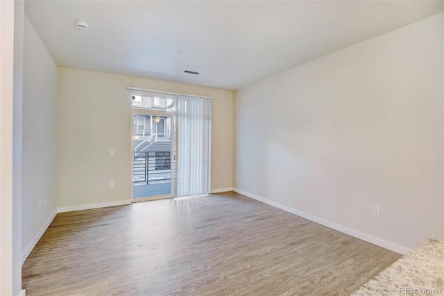 empty room featuring light hardwood / wood-style flooring