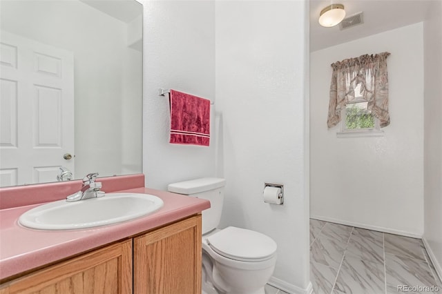 12825 Forest Way, Thornton, CO 80241 - bathroom with vanity and toilet