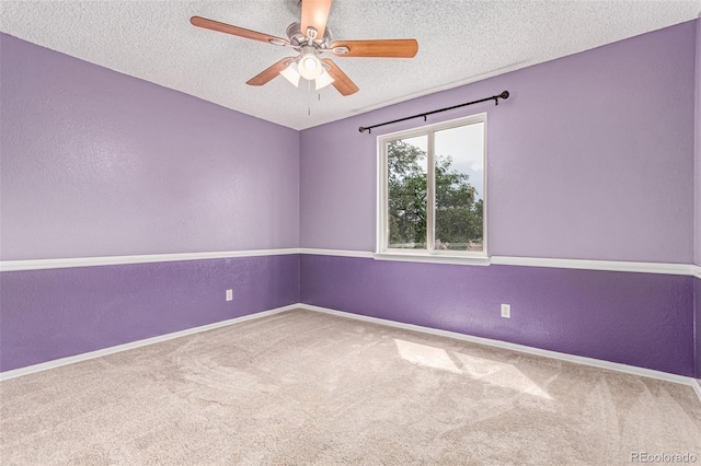12825 Forest Way, Thornton, CO 80241 - carpeted spare room with a textured ceiling, ceiling fan, and a textured wall