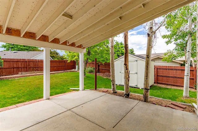 12825 Forest Way, Thornton, CO 80241 - fenced backyard with a patio and a storage shed