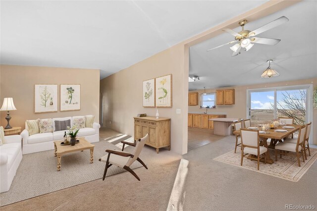 35650 Private Road 35, Kiowa, CO 80117 - living room featuring light colored carpet, ceiling fan, and vaulted ceiling