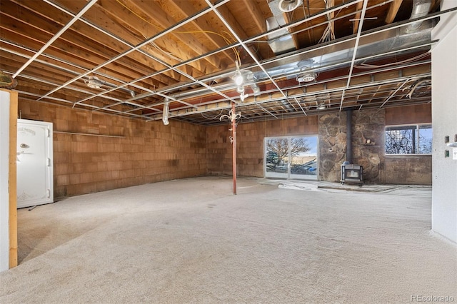 35650 Private Road 35, Kiowa, CO 80117 - below grade area with a wood stove and carpet