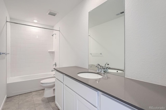 bathroom with visible vents, tub / shower combination, toilet, and vanity