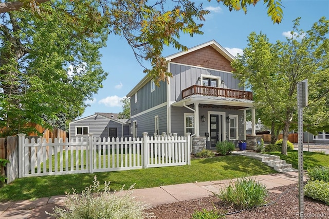 4603 W 33rd Ave, Denver, CO 80212 - view of front facade featuring a balcony and board and batten siding