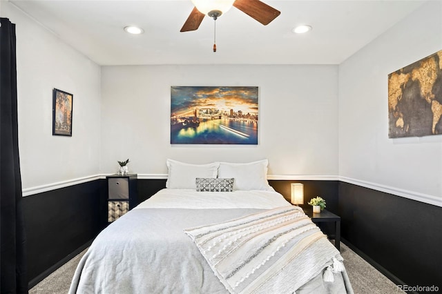 carpeted bedroom featuring ceiling fan and recessed lighting