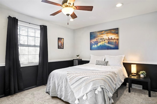 bedroom featuring recessed lighting, light carpet, and ceiling fan