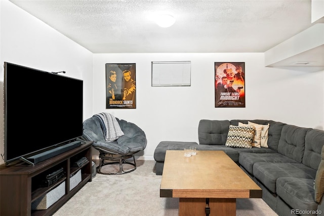 living room with a textured ceiling and light colored carpet