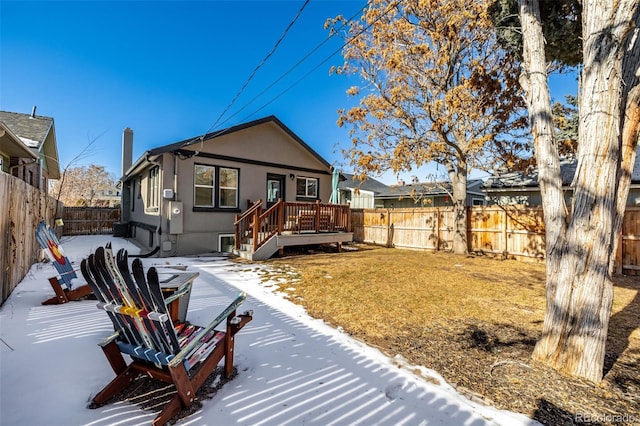 view of front of house featuring a wooden deck