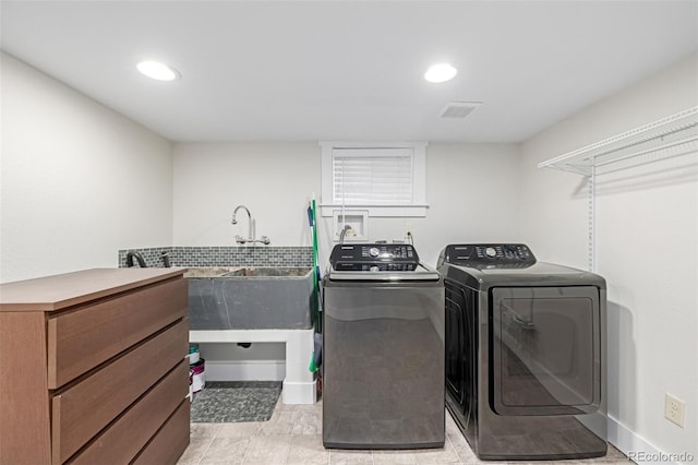 washroom with laundry area, independent washer and dryer, and recessed lighting