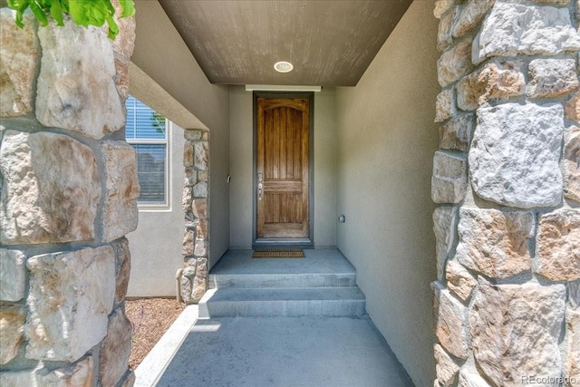 2347 S Loveland St, Lakewood, CO 80228 - property entrance with stucco siding and stone siding