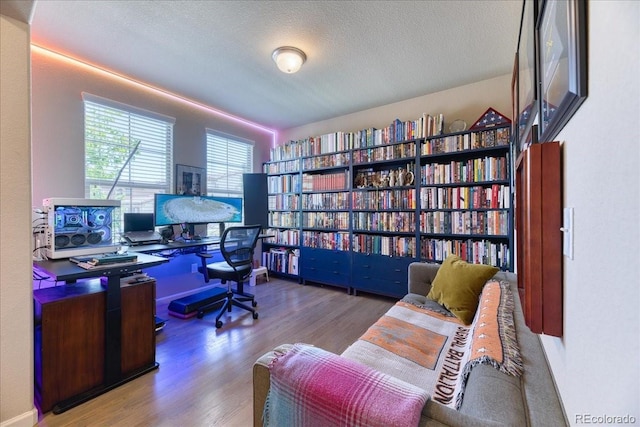 2347 S Loveland St, Lakewood, CO 80228 - office area featuring wood finished floors and a textured ceiling