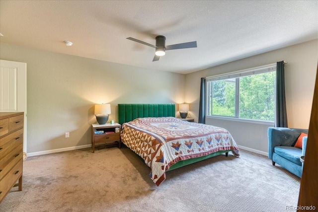 2347 S Loveland St, Lakewood, CO 80228 - bedroom with carpet floors, baseboards, and a ceiling fan