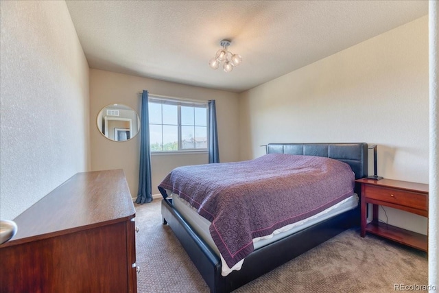 2347 S Loveland St, Lakewood, CO 80228 - carpeted bedroom featuring a textured wall