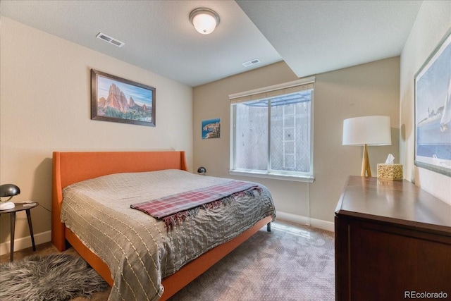 2347 S Loveland St, Lakewood, CO 80228 - carpeted bedroom with baseboards and multiple windows