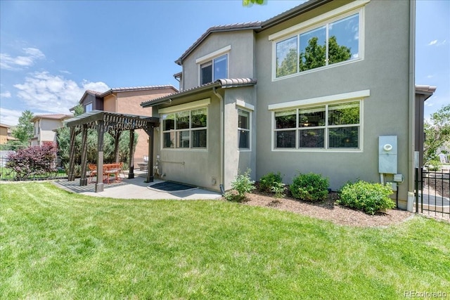2347 S Loveland St, Lakewood, CO 80228 - back of house featuring a patio, stucco siding, and a pergola