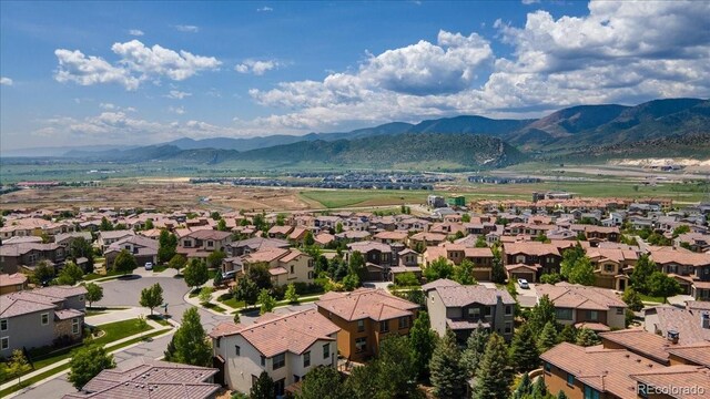 2347 S Loveland St, Lakewood, CO 80228 - aerial view of residential area featuring a mountain backdrop