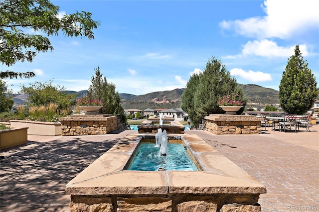 2347 S Loveland St, Lakewood, CO 80228 - view of swimming pool with a mountain view