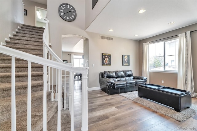 10695 Wynspire Rd, Highlands Ranch, CO 80130 - living area with wood finished floors, recessed lighting, baseboards, and stairs