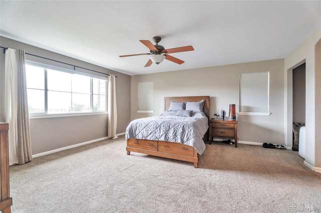 10695 Wynspire Rd, Highlands Ranch, CO 80130 - carpeted bedroom with baseboards and a ceiling fan