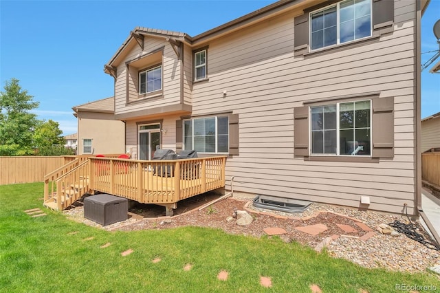 10695 Wynspire Rd, Highlands Ranch, CO 80130 - rear view of house featuring a wooden deck