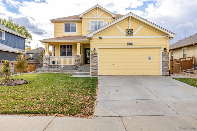 craftsman-style house with a garage, a porch, and a front yard