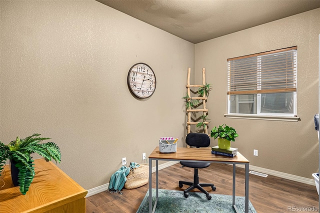 office space featuring dark hardwood / wood-style flooring