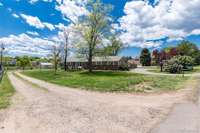 10220 W Montgomery Ave, Littleton, CO 80127 - view of front of home featuring driveway